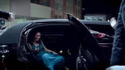 Excited fans scream and wave as celebrity steps out of limousine and walks up red carpet at awards show Stock Footage