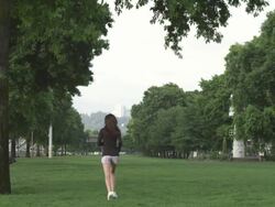 MS POV SLO MO Shot of young female jogging in garden / Portland, Oregon, United States  Stock Footage