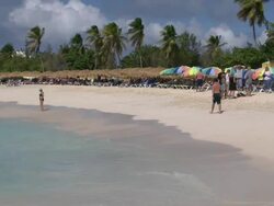 Mullet Bay Beach palapas on Dutch St. Maarten Stock Footage