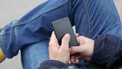 Young male with cell phone Stock Footage