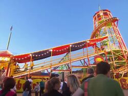 visitors stand in front of  "Toboggan" Stock Footage
