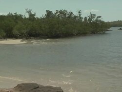 Gentle waves reveal isolated beach, Australia Stock Footage