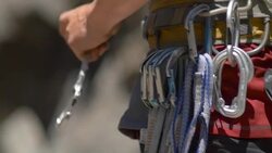 Details of rock climbing equipment. - Slow Motion Stock Footage