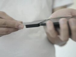 CNGLRET1047 People making mobile payment Stock Footage