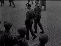 BRUSSELS HEARS MONTY - News Clip