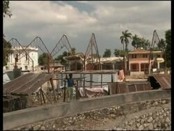 AP looks at situation in town at epicentre one month after quake; UN briefing News Clip