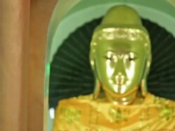 Colorful, religious statues in the Shwedagon in Yangon, Myanmar Stock Footage
