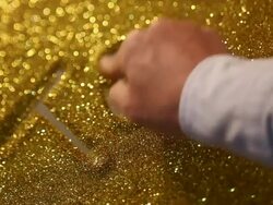 hand writing"top 10 " on golden sand background Stock Footage