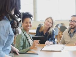 Hispanic female adult student joining diverse study group in college library Stock Footage