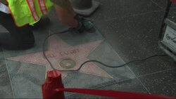 Workers sanded and swept away any signs of vandalism on Bill Cosby's Walk of Fame star Friday. (Dec. 5) Instructional Video
