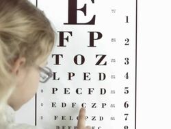 HD: Girl Reading Eye Chart Stock Footage