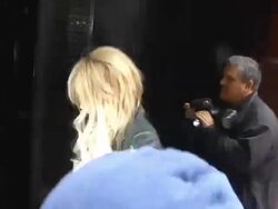 Lindsay Lohan rushes pass the paparazzi as she arrives at the Mercer Hotel in New York 04/12/11 (Footage by WireImage Video/GettyImages) Stock Footage