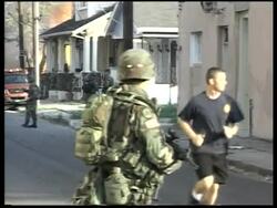 City dwellers who stayed behind, miltary, aerials News Clip