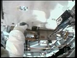 Space walk to work on shuttle's solar power system News Clip