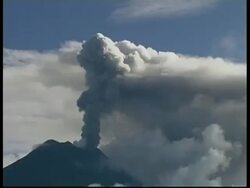 MS grey smoke and ash cloud billow from crater into sky, Mount Tunguragua, Ecuador Stock Footage