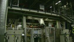 Robotic arms operate in a factory. Stock Footage