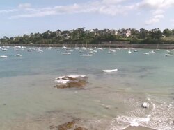 WS Ferryboats bobbing on water / Lancieux, Brittany, France Stock Footage