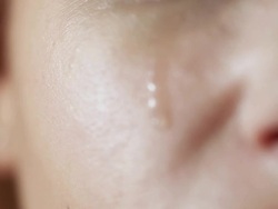 Woman crying closeup Stock Footage
