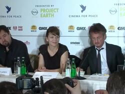 Sean Penn lighting up a cigarette in the press conference at the Cinema for Peace Press Conference: 61st Berlin International Film Festival at Berlin . (Footage by WireImage Video/GettyImages) Stock Footage