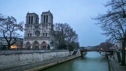 HD Timelapse: Notre Dame Cathedral at dusk in Paris, France Stock Footage