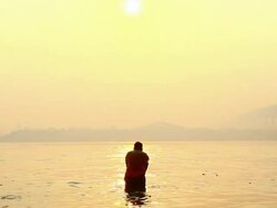 MS PAN Shot of pilgrims bathing in River Ganges during Kumbh Mela / Allahabad, Uttar Pradesh, India Stock Footage