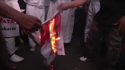 CLEAN : Indonesia fights to rein in radicals behind governor protests News Clip