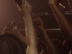 SLO MO crowded nightclub, people taking photos with mobile phones / New York, New York Stock Footage