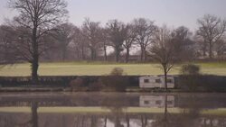 Frosty early morning by lake, rural France Stock Footage