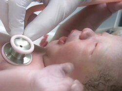 NEWBORN HEART CHECK (HD/SD) Stock Footage