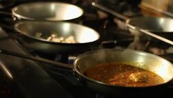 A chef prepares a sauce. Stock Footage