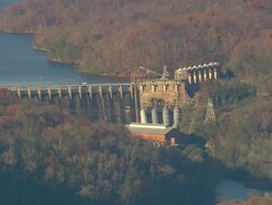 MS AERIAL Shot of dam surrounded by wooded area / North Carolina, United States Stock Footage