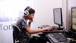 Boy using computer Stock Footage