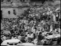 B/W 1959 high angle wide shot crowd on stairs + in front of capitol building / post-revolution Havana / newsreel Stock Footage