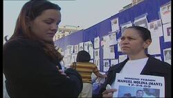 Relatives of 9/11 victims with misisng posters News Clip