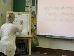 MS Teacher preparing lesson plan about learning alphabet in classroom at school / Minneapolis, Minnesota, United States Stock Footage