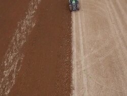 Aerial view of Tractor Ploughing Stock Footage