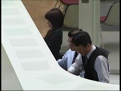 Stocks open down following announcement of record trade deficit News Clip