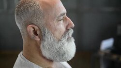 brutal barber clipper mows bearded adult senior hipster Stock Footage