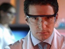 HD DOLLY: Scientist Taking Off His Protective Eyewear Stock Footage