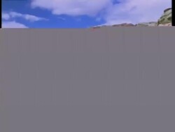 Track over scrubland to coiled prairie Rattlesnake, which strikes at camera, United States of America Stock Footage