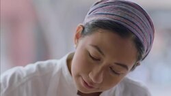 Pastry chef dots colorful dessert dish with yellow custard from squeeze bottle Stock Footage