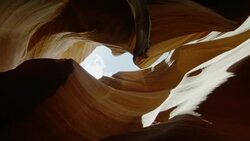 Beautiful unique caves with washed walls sit in the sunlight. Stock Footage