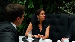 MS Business executives sitting in discussion during lunch meeting in restaurant Stock Footage