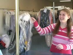 Picking Up Clothes Stock Footage