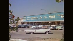 WS PAN Car parked near art gallery / United States Stock Footage