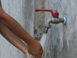 Boy are opening faucet Stock Footage