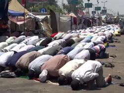 Men Praying At Rabaa Camp News Clip