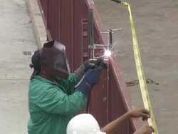 (HD1080i) Construction: Welding Metal Fence Stock Footage