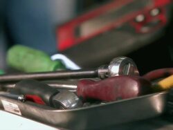 CU Man's hand grabbing tool from pile of tools / Tampa, Florida, USA Stock Footage