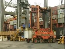 Containers being moved, Container Terminal, Southampton, UK Stock Footage